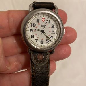 1990s vintage swiss army watch with brown leather strap & date dial.